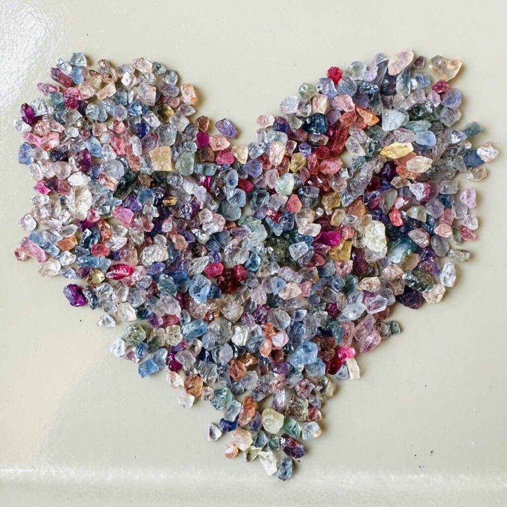 A heart of Moyo Sapphires in a rainbow of colors. Photo courtesy of Chloe Beaumont.