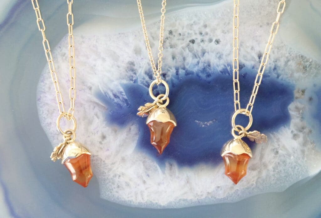 mini acorn charms in carnelian by Mercurius