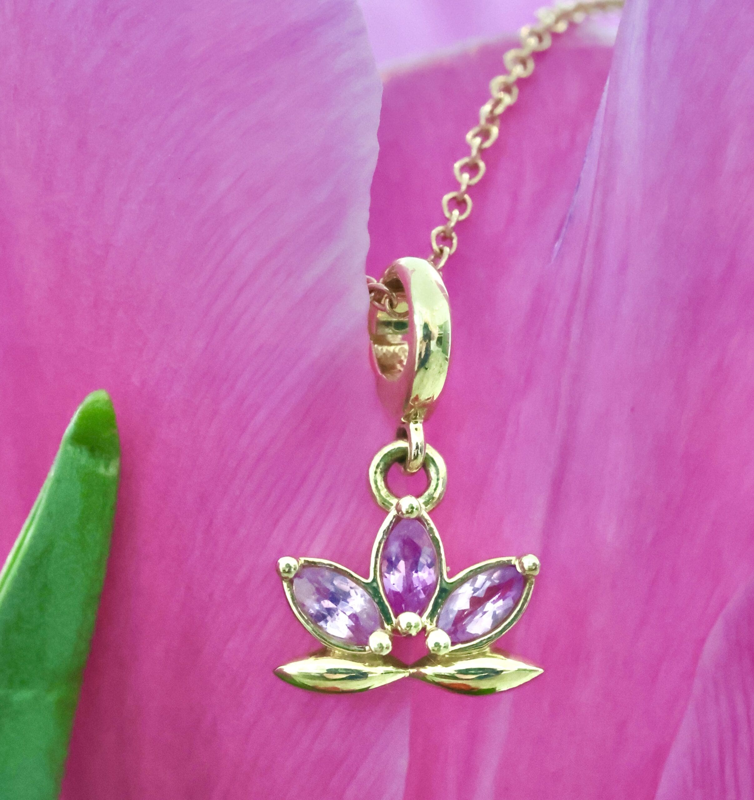 lotus flower charm shown in gift giving guide